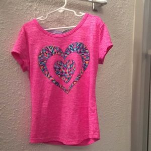 Cute exercise shirt, cross back.